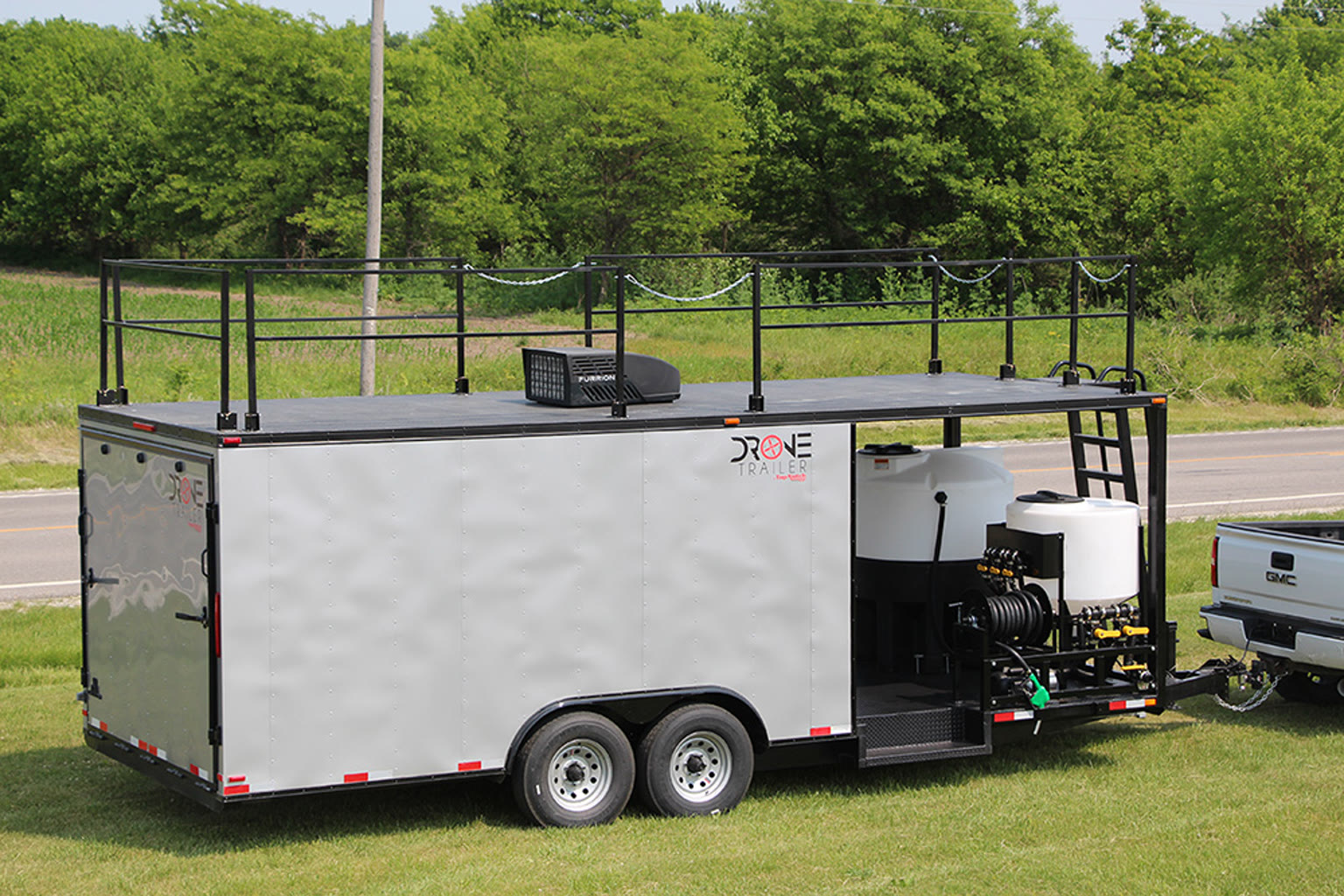 Agricultural UAV trailer and landing deck